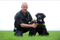 Police dog, Sam the Labrador with Grampian Police dog handler, George Shearer