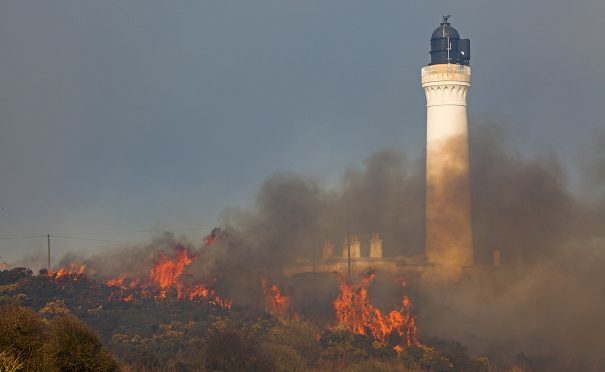 The fire engulfs an area around Covesea Lighthouse. Picture by John MacGregor