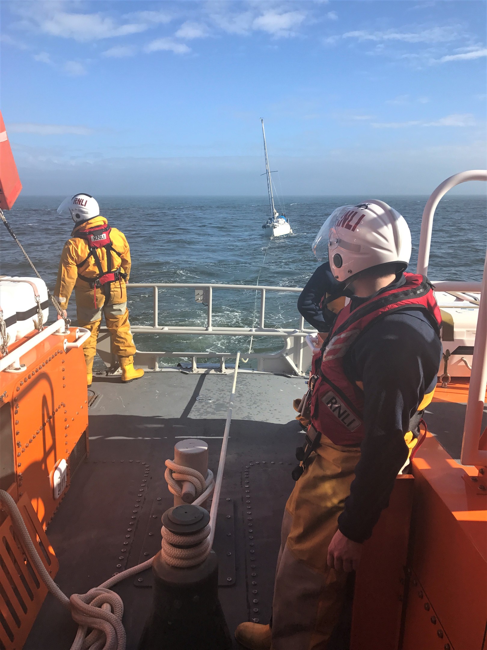 Crew on board the Aberdeen lifeboat tow the stricken Fleur back to Aberdeen harbour