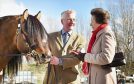 Princess Anne chats to John Reid and his supreme champion Highland pony