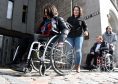 Future Choices challenged Aberdeen City Councillors to travel from Union Square shopping centre to Aberdeen Town House in a wheelchair. Pictured are Councillor Marie Boulton and Councillor Len Ironside on Broad Street.