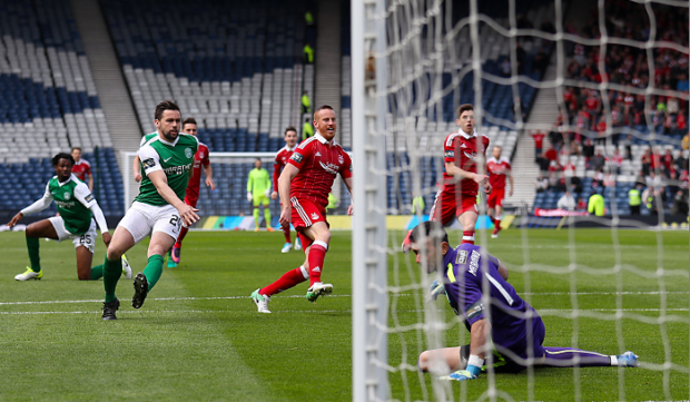 Adam Rooney scores just 12 seconds into the game   Andrew Milligan/PA Wire