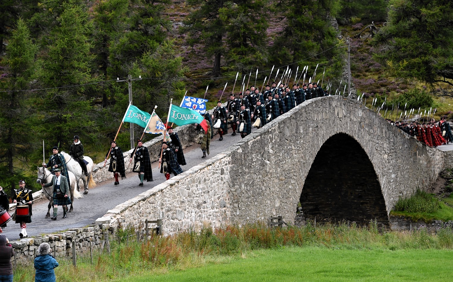 Gairnshiel Bridge on the A939. The bridge was never built for cars. Here, the Lonach Highlanders march over the crossing in 2015.