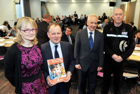 Staff attended a briefing about the new childrens' services plan at Moray College. Pictured: Malcolm Wright, chief executive NHS Grampian, Susan Webb, director of public health, Chief Superintendent Campbell Thomson, Police Scotland and Roddie Burns, chief executive Moray Council.
