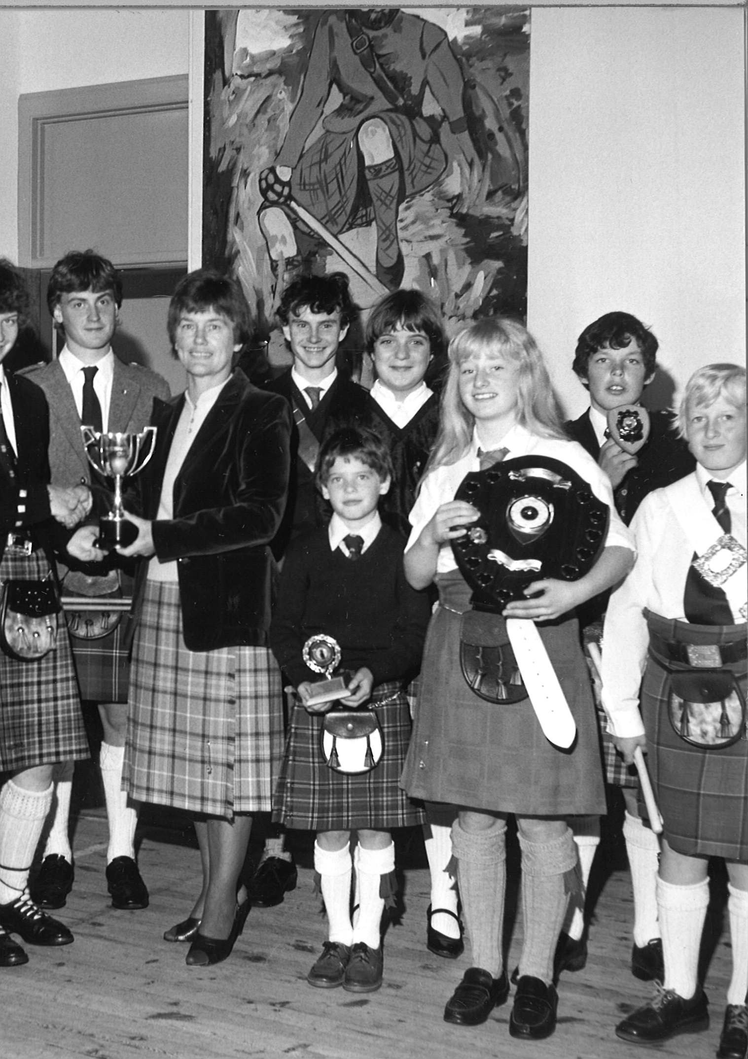 Drumming competition winner Susan Low presented with her trophy at Carrbridge Ceilidh Week, 1983