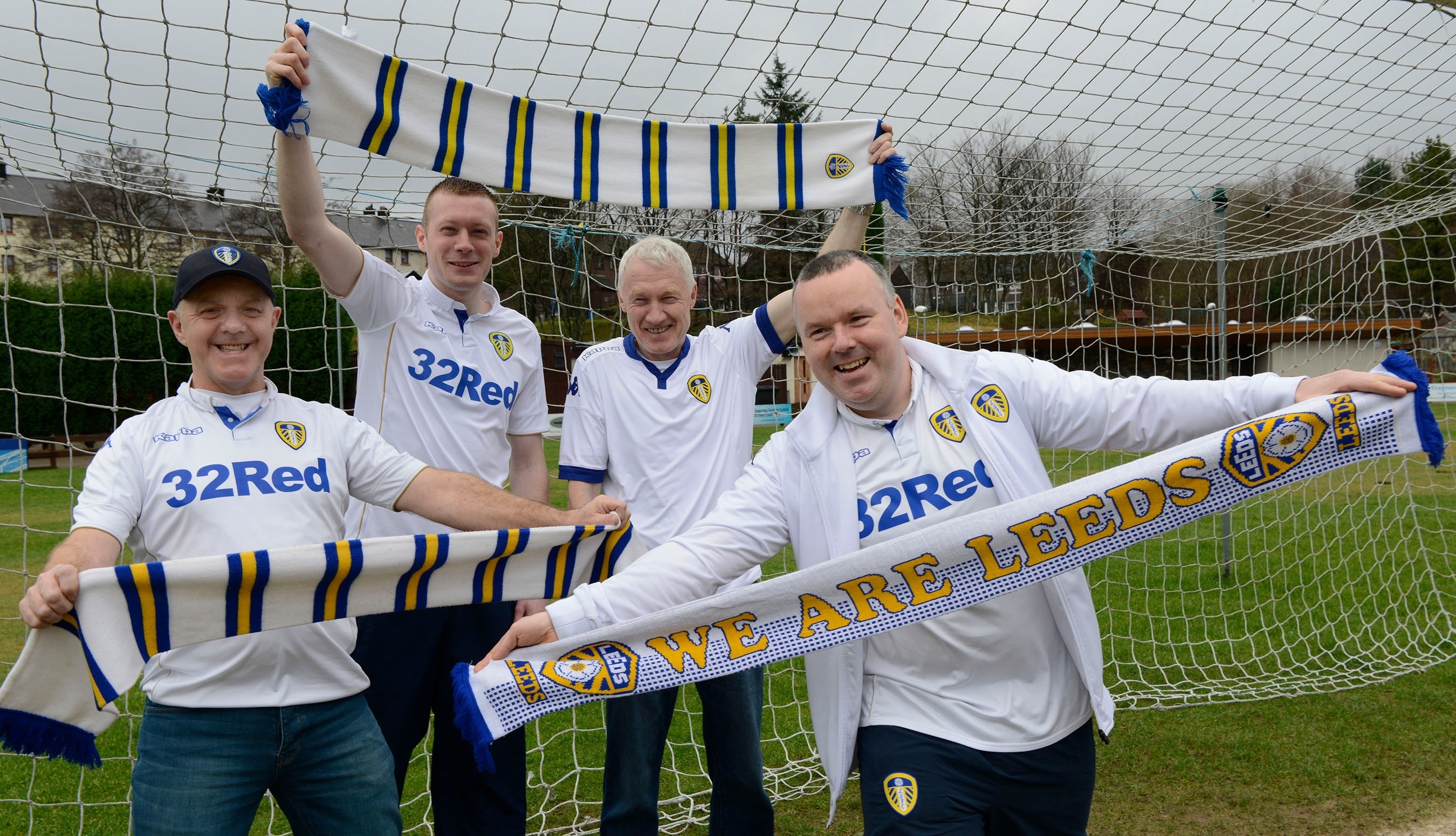 Peter (left) and Martin (right) MacDonald with Bradley (second left) and John Flannigan who attend each Leeds home game