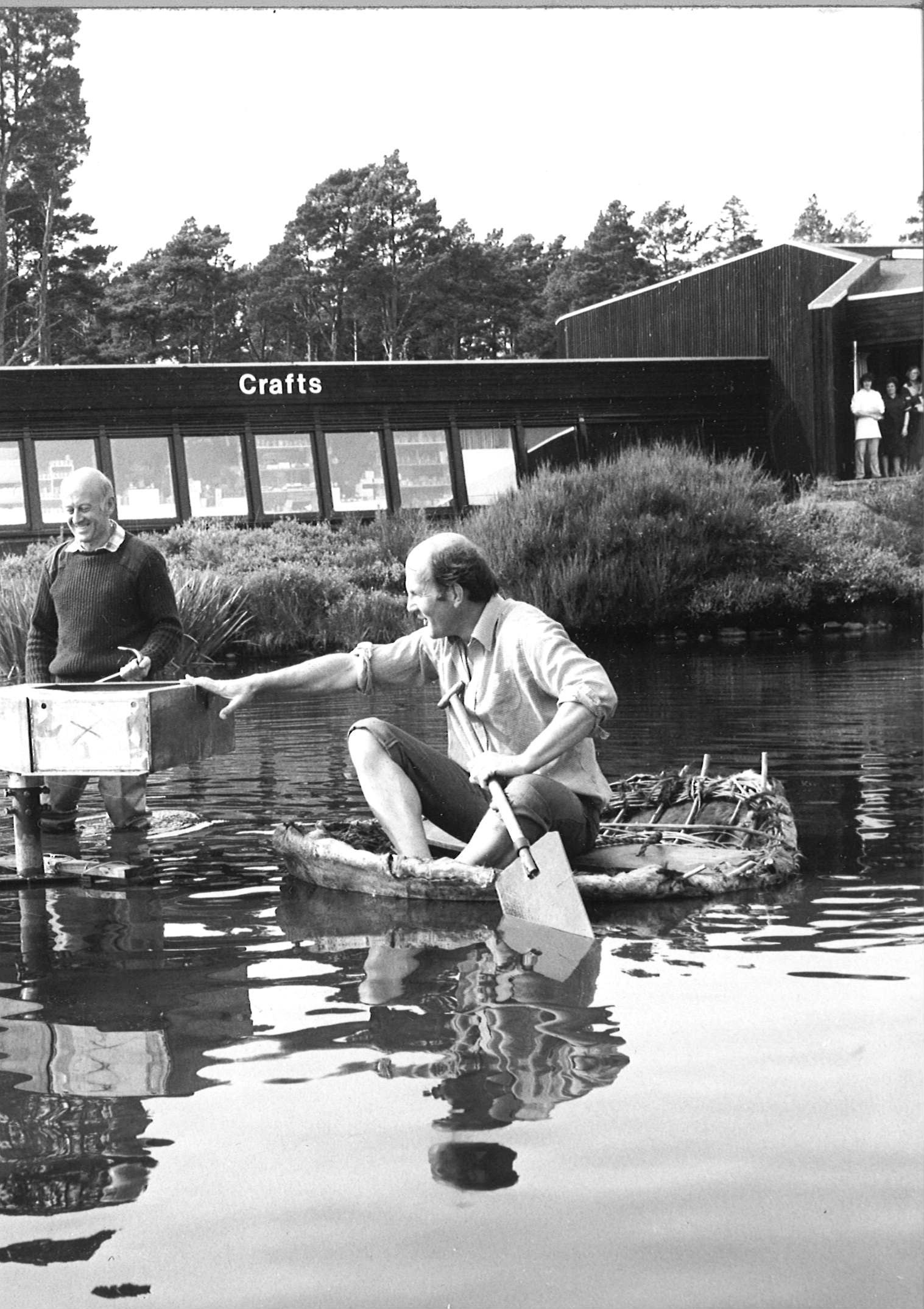 New sculpture in pond at Landmark. 1983. In the picture are Landmark owner David Hayes and handyman Granville Brown