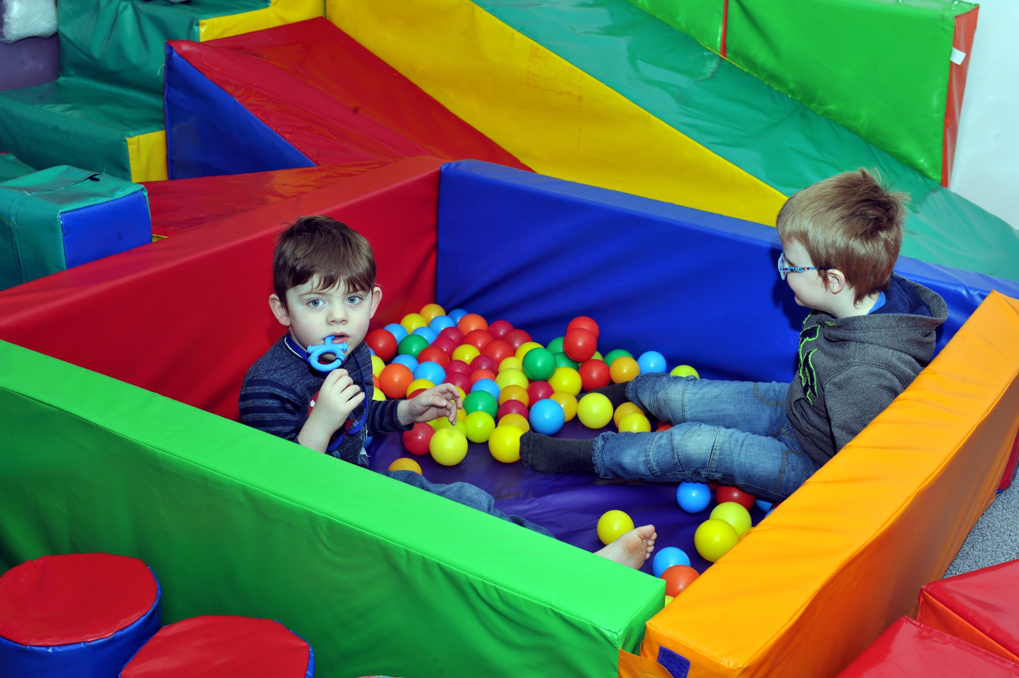 Some of the children in the soft play area. 