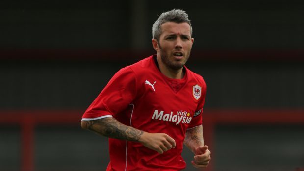 Kevin McNaughton experienced relegation with Cardiff City.