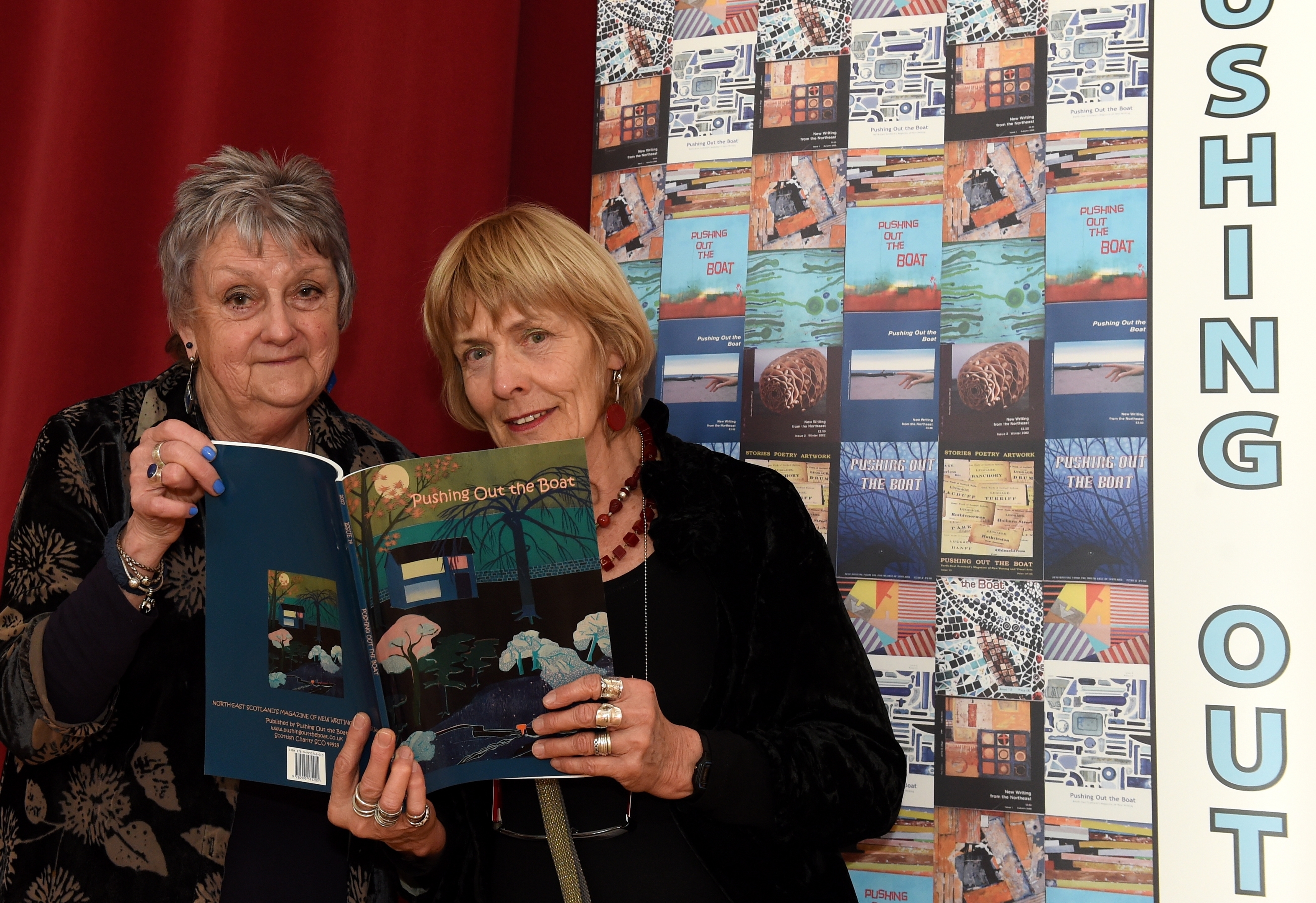 In the picture are from left: Dolleen Maclennan, left and Hilda Frewin with the front cover.
