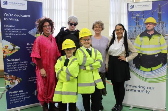 Milne's Primary School pupils Aiden and Sophie with actors from Talkmor Theatre.