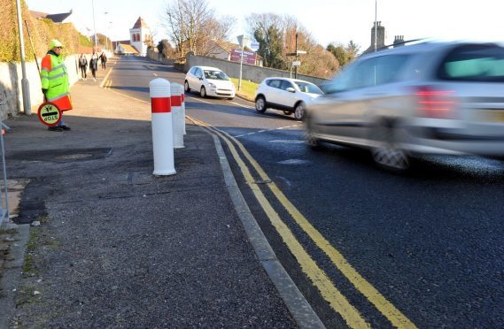 Campaigners want improvements to the junction at School Brae in Lossiemouth.