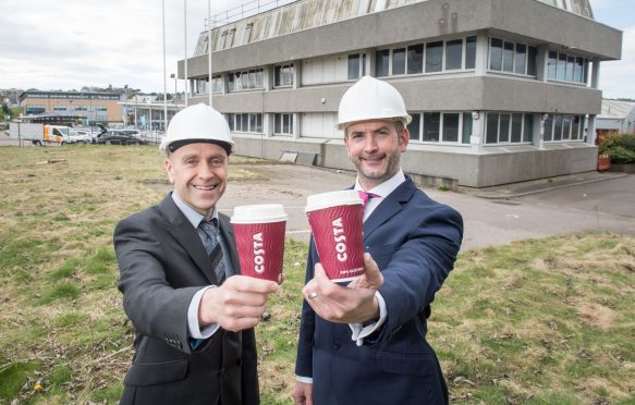 Aberdeen, Scotland, Thursday 20th April 2017

An Aberdeen office that has lain vacant for almost two years is to be raised to the ground this week after development and investment firm, West Coast Estates secured planning permission to transform it into a drive-thru Costa Coffee.

Pictured is:  Doug Gardner and Paul Richardson from the surveying company Ryden

Picture by Michal Wachucik / Abermedia