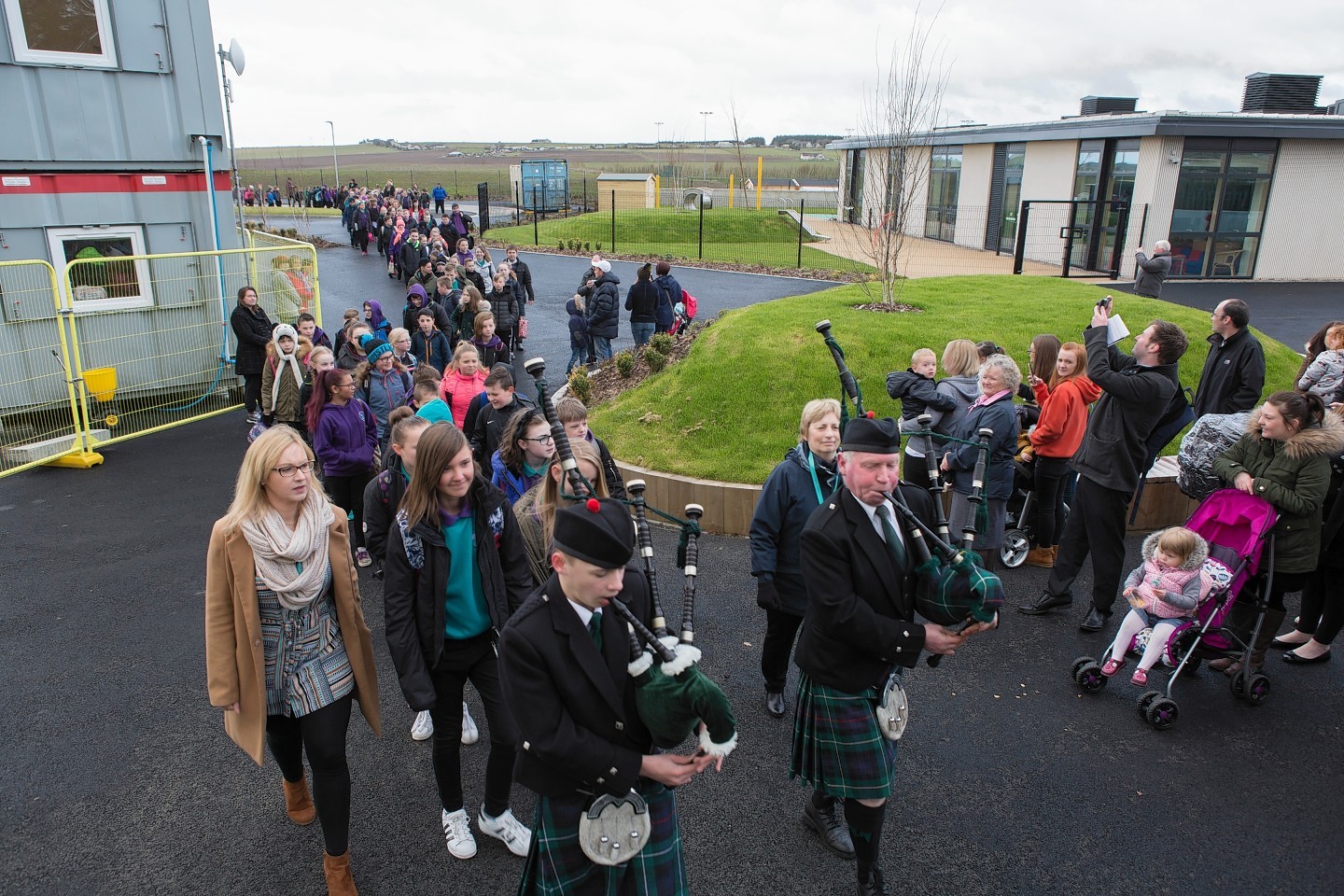 A parade to the new Wick Campus of pupils from Newton Park Primary