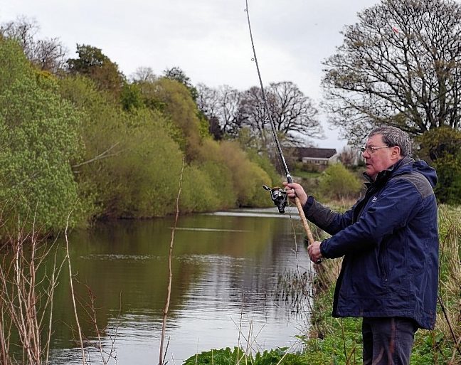 Bill Fraser of the Elgin Angling Association fishing the River Lossie