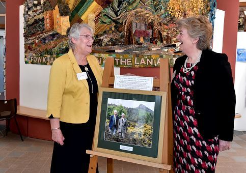 The Bennachie Visitor Centre opens for the season. Pictured with a photograph of Algy Watson and James Mackay is Mary MacKay (left) whose late husband James was one of the driving forces of the centre and chair Sheena Lonchay (right)