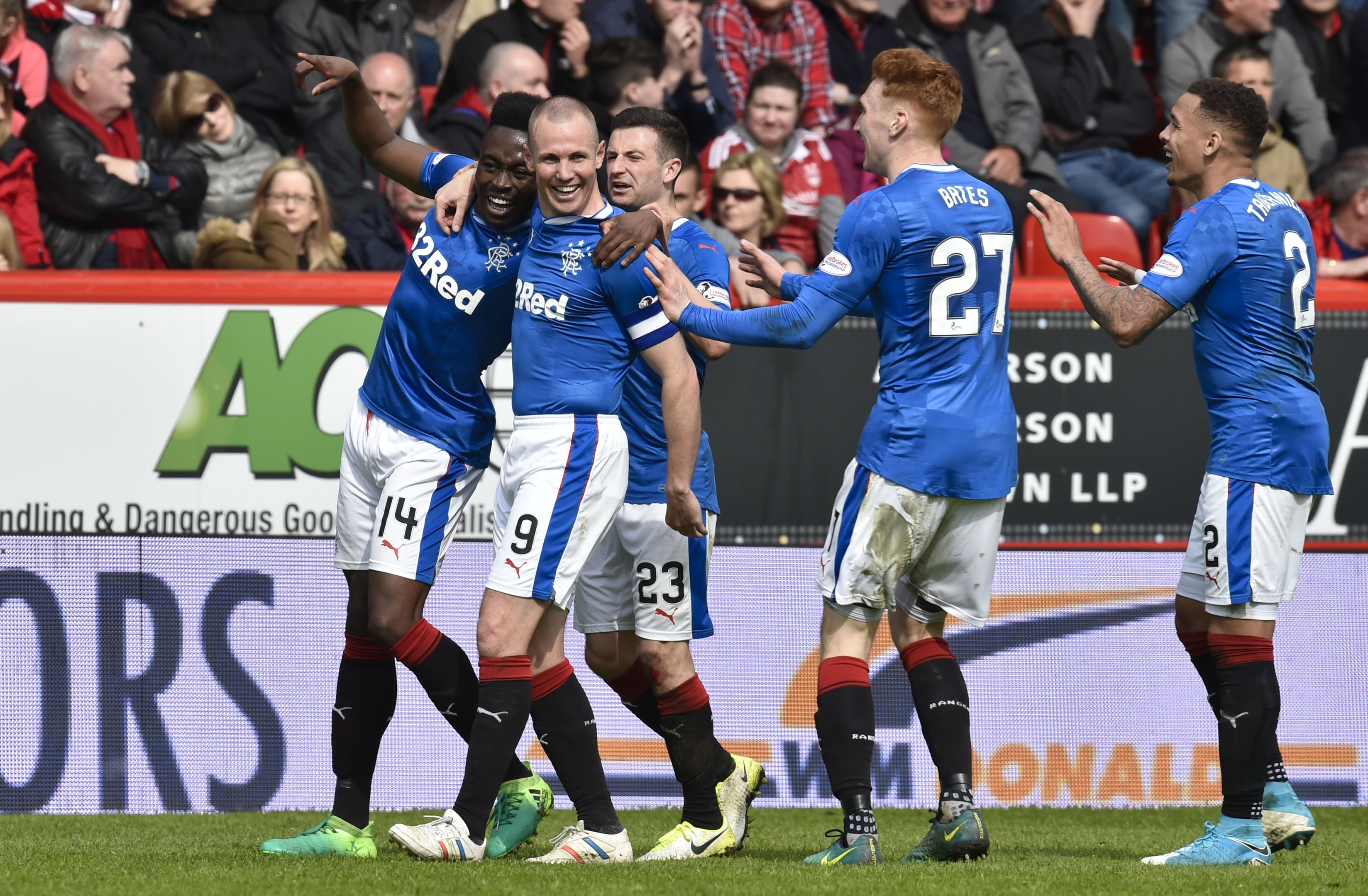 Kenny Miller celebrates with Joe Dodoo