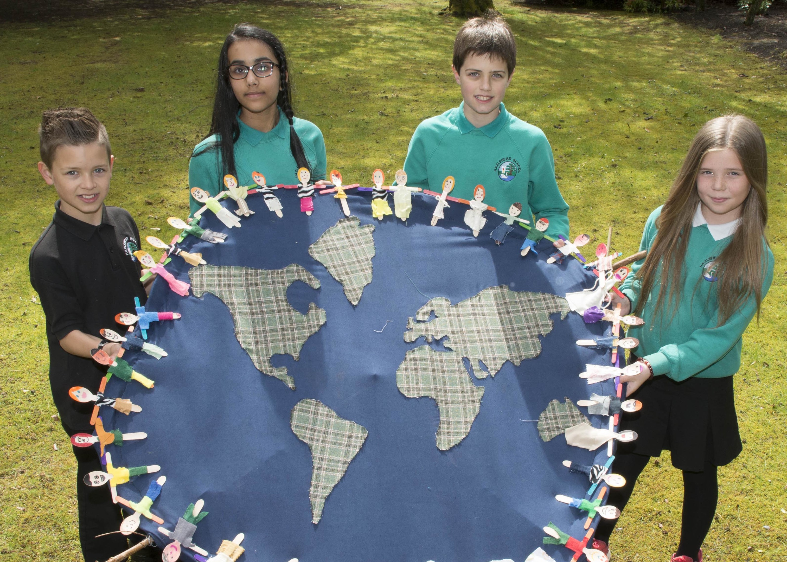 28/04/17 L-R Gregor Morison (10YO pr6),Hayfa Sheik (12YO pr7), Finlay Clubb (11YO pr7),Aaliyah Craig (11YO pr7)

The Global Group at Hazlehead School unveils its Global Goal sculpture trail at Hazlehead Park today. The school project aims to educate the community about the Global Goals as decided by the United Nations.  The sculpture trail, designed by and built by all the Primary School pupils, has 17 sculptures representing each of the 17 Global Goals.  All primary children have contributed to the sculptures.