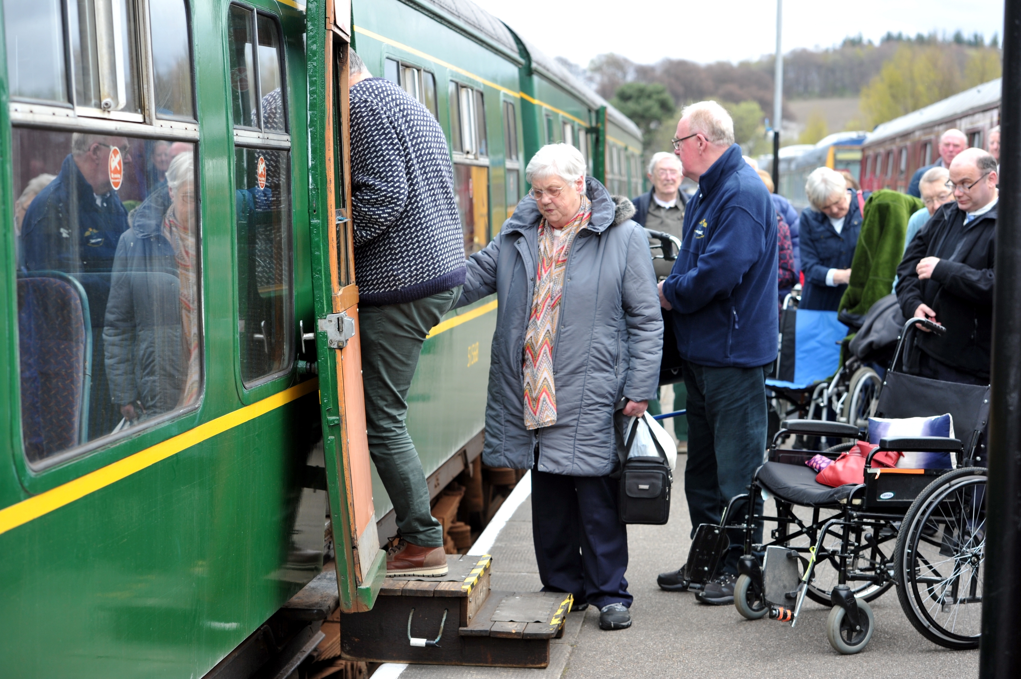 Members of Elgin Stroke Club boarding the train at Dufftown Station during their visit to Keith and Dufftown Railway. 