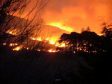 Wildfires have occurred in the west of Scotland while the rest of the country is battling heavy snow.