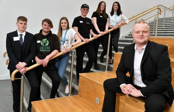 l-r team managing directors Archie Whyte, Spencer O'Grady, Mairi Falls, Jordan Kearney, Robyn Connell, Megan Kemp with lead judge Jamie Hutcheon of Cocoa Ooze