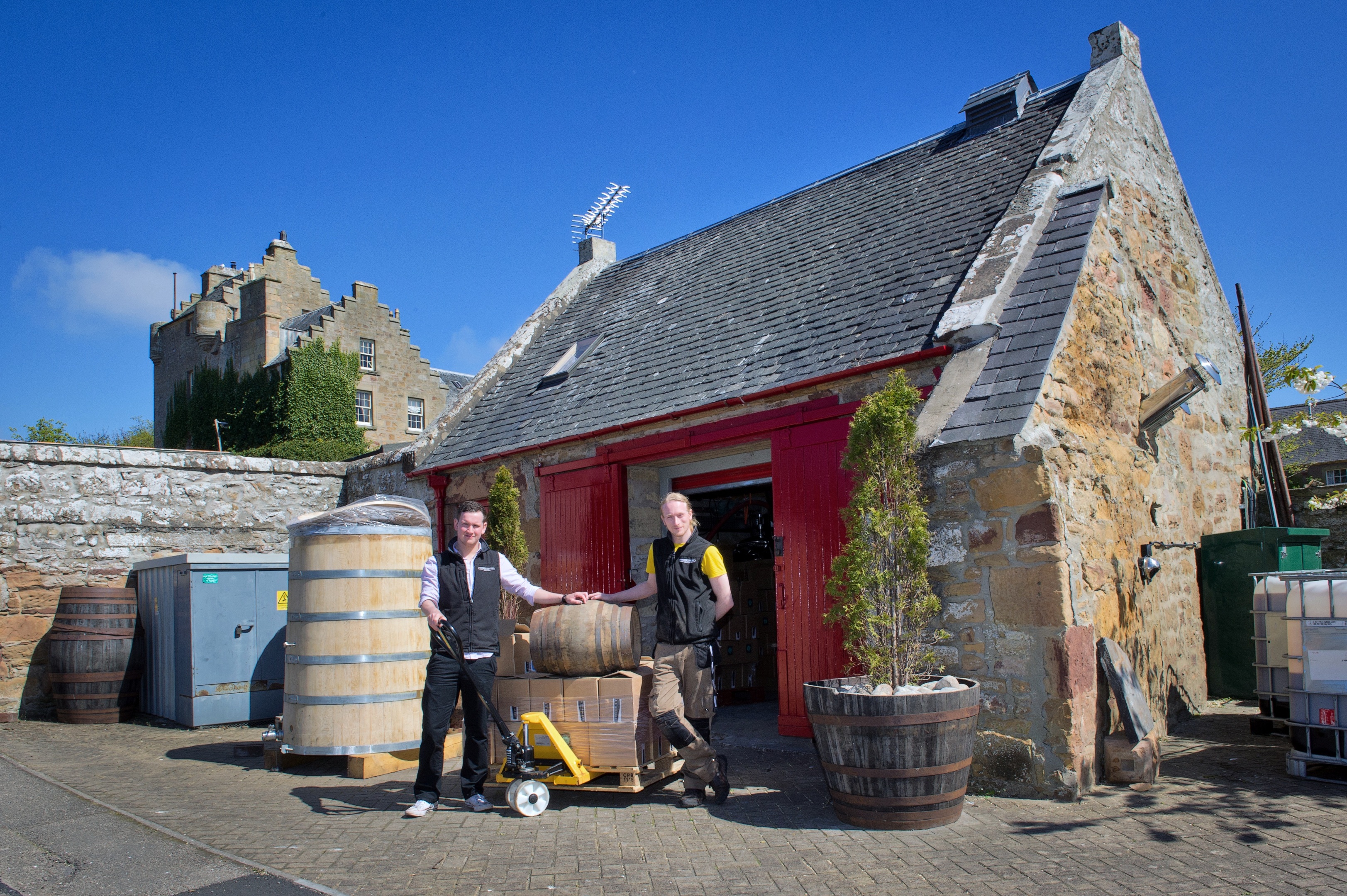 Rolling out the barrel - Phil, left, and Simon Thompson. of Dornoch Distillery.