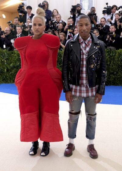 Helen Lasichanh, left, and Pharrell Williams