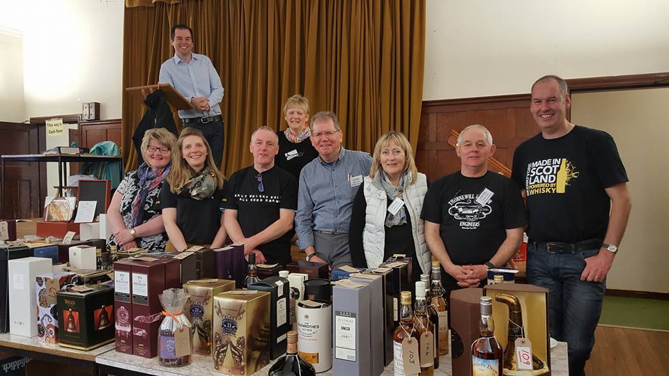 The Craigellachie Village Council at the whisky auction