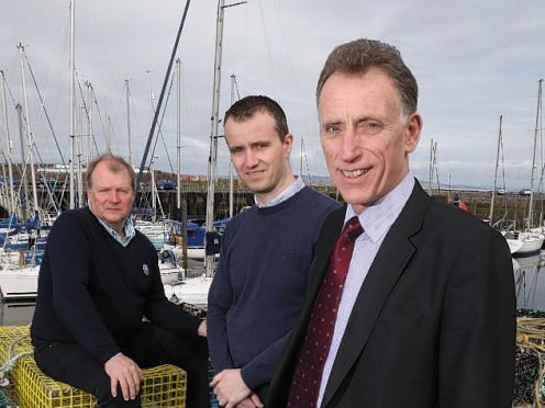 Nairn business leaders Michael Green and Michael Boylan welcome Alan Rankin.