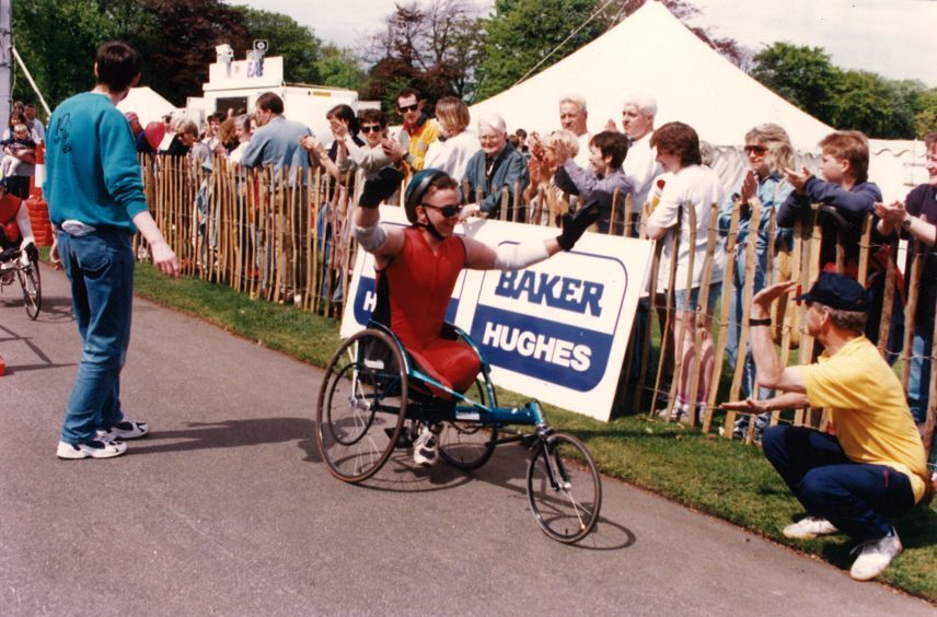 Wheelchair event winner Kenny Suttie comes home in delight in 1997