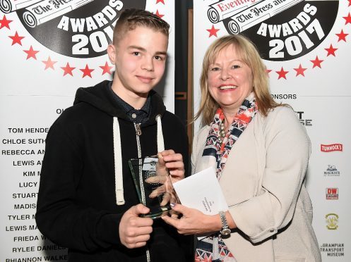 Jake Dawson (Buckie) who recieved the winner's award by Denise West, P&J Head of Commercial and Advertising.