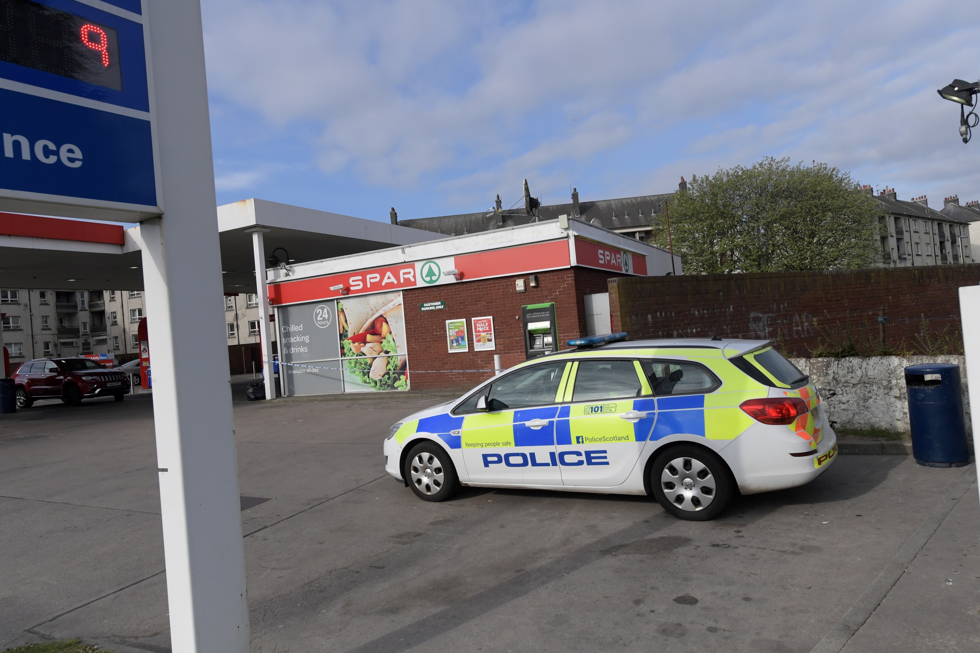 Police at the scene outside Esso