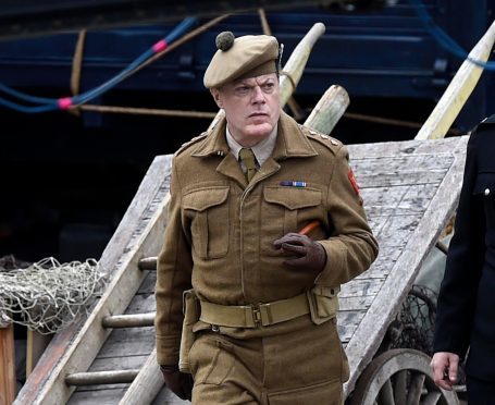 Eddie Izzard on set in Portsoy