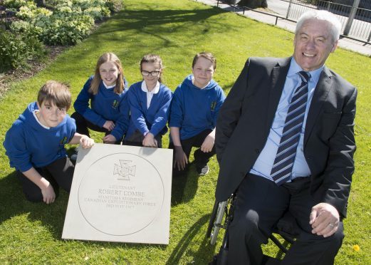 03/05/17 Vice Lord Lieutenant Andrew Lawtie with Ferryhill Primary School House captains- pupils L-R Matthew Wheeler, Bryony Anderson, Alexane Wood, and Kieran Thomson, all 11YO pr7

A commemorative stone was laid in Aberdeen today (Wednesday 3 May) to mark the centenary of the death of First World War Victoria Cross recipient Robert Grierson Combe.Born on Holburn Road, Aberdeen in 1880, Robert Combe attended Ferryhill School and Aberdeen Grammar School before taking up an apprenticeship as a pharmacist.  He emigrated to Canada in 1906 where he opened his own pharmacy business in Melville, Saskatchewan before enlisting in the Canadian Expeditionary Force.