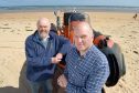 Photographed with their lifeboat on Dornoch Beach are Neil Dalton (left) Chairman of the Association and on the right Antony Hope, a crew member. Pic by Sandy McCook