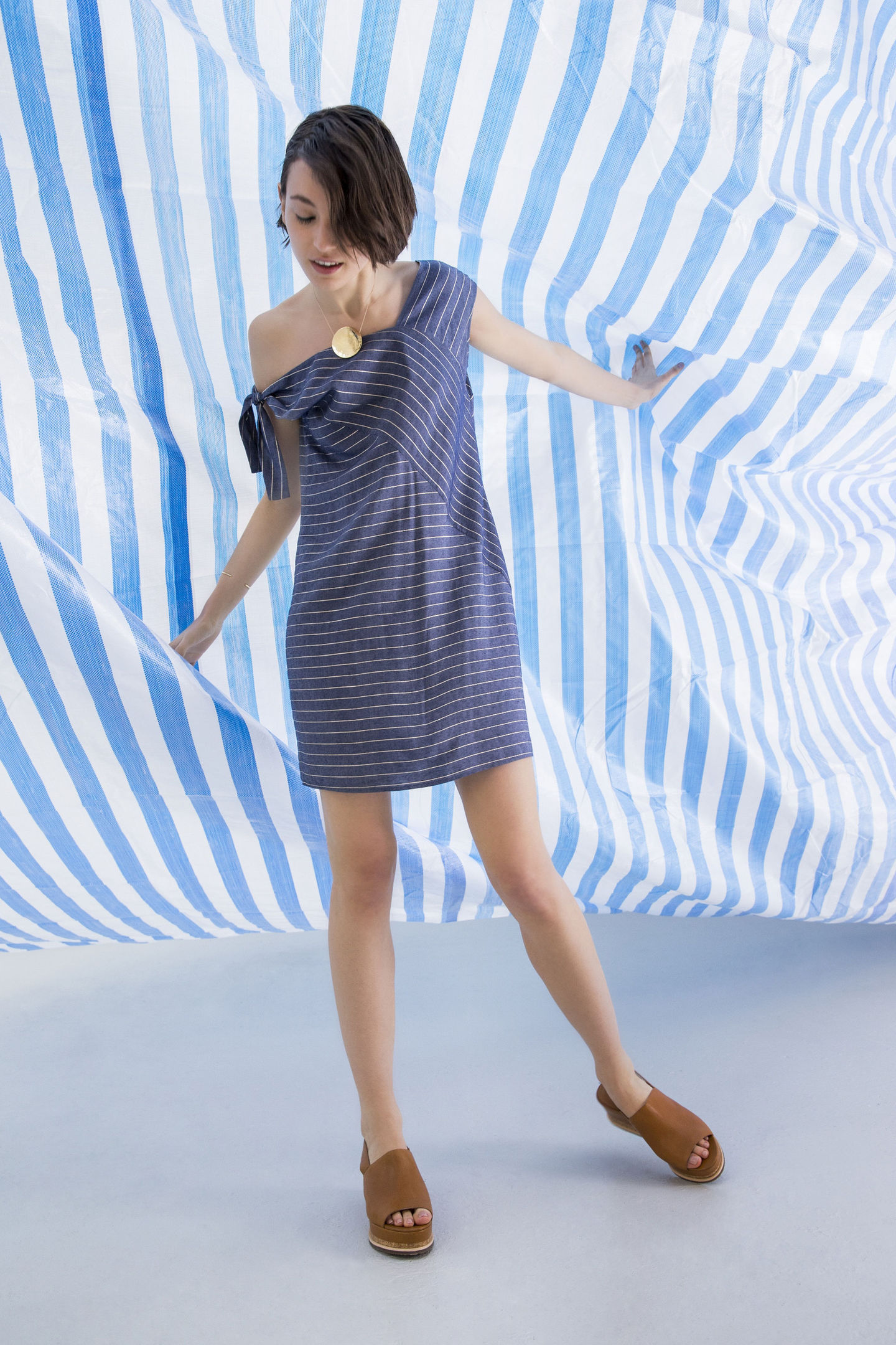 Undated Handout Photo of a model wearing the Oliver Bonas Absorb Asymmetric Stripe Dress, available from oliverbonas.com. See PA Feature FASHION Stripes. Picture credit should read: PA Photo/Handout. WARNING: This picture must only be used to accompany PA Feature FASHION Stripes. WARNING: This picture must only be used with the full product information as stated above.