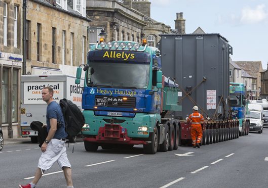 One of four giant transformers bound for the new Spittal AC Sub Station makes it way through Thurso's streets on Sunday morning.