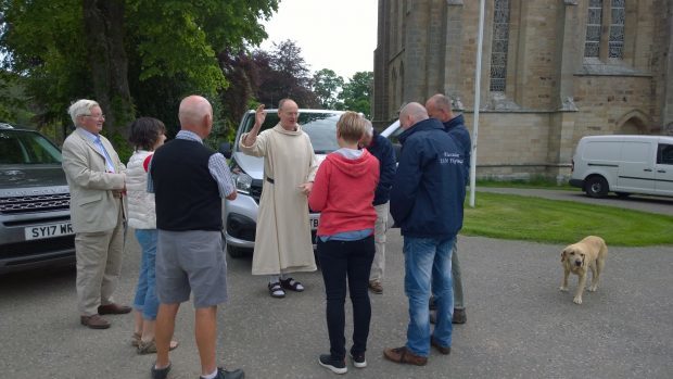 Pluscarden Abbey prior Father Benedict blesses the pilgrims as they depart Moray.