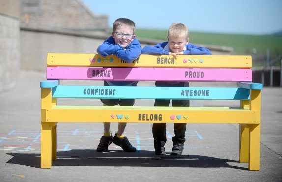 Craig Dick (left) and Max Haywood with the 'happy bench'