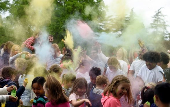 Nobody was safe from the colourful powder in Grant Park.