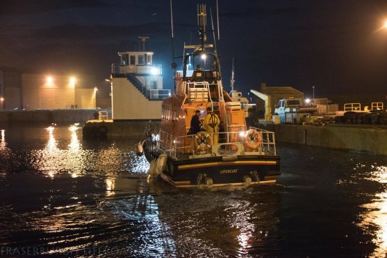The Fraserburgh Lifeboat leaves the harbour to attend to the emergency.