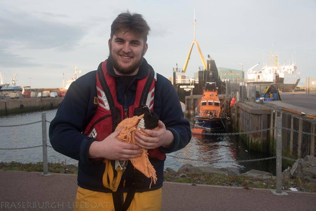 Marten Ritchie with the rescued bird at Fraserburgh's lifeboat station.
