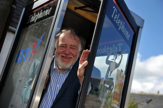 Jim Mackie believes the phone box on Garmouth's High Street is the perfect home for a defibrillator.