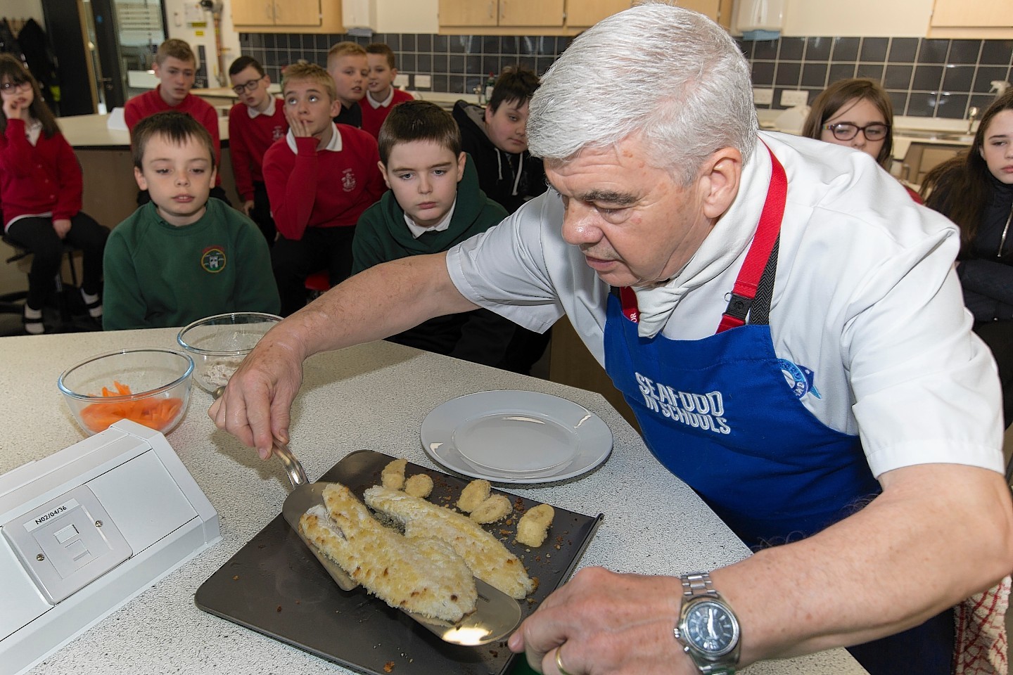 Aviemore-based chef Alan Frost, prepares a fish dish during the Seafood in Schools roadshow