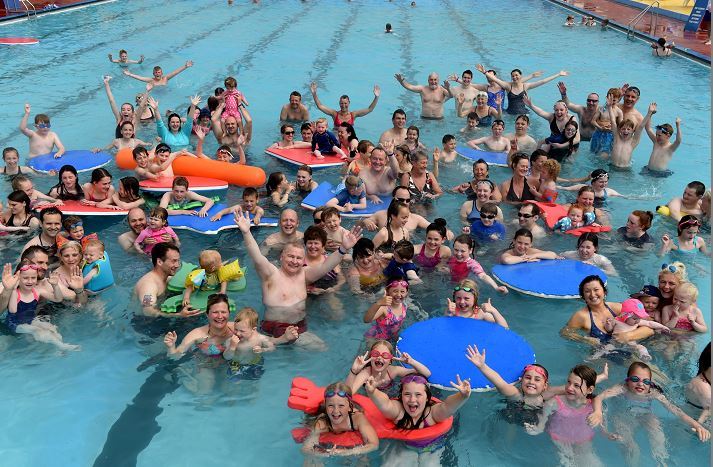 Swimmers enjoying the Stonehaven Open Air Pool season opening party