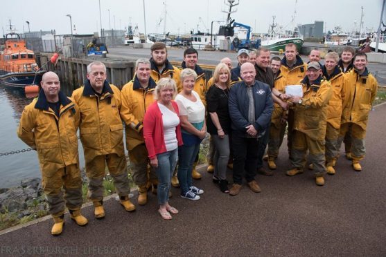 The Class of '83 present their donation to Fraserburgh lifeboat crew