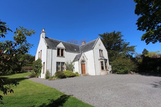 This stunning home comes with its own tennis court