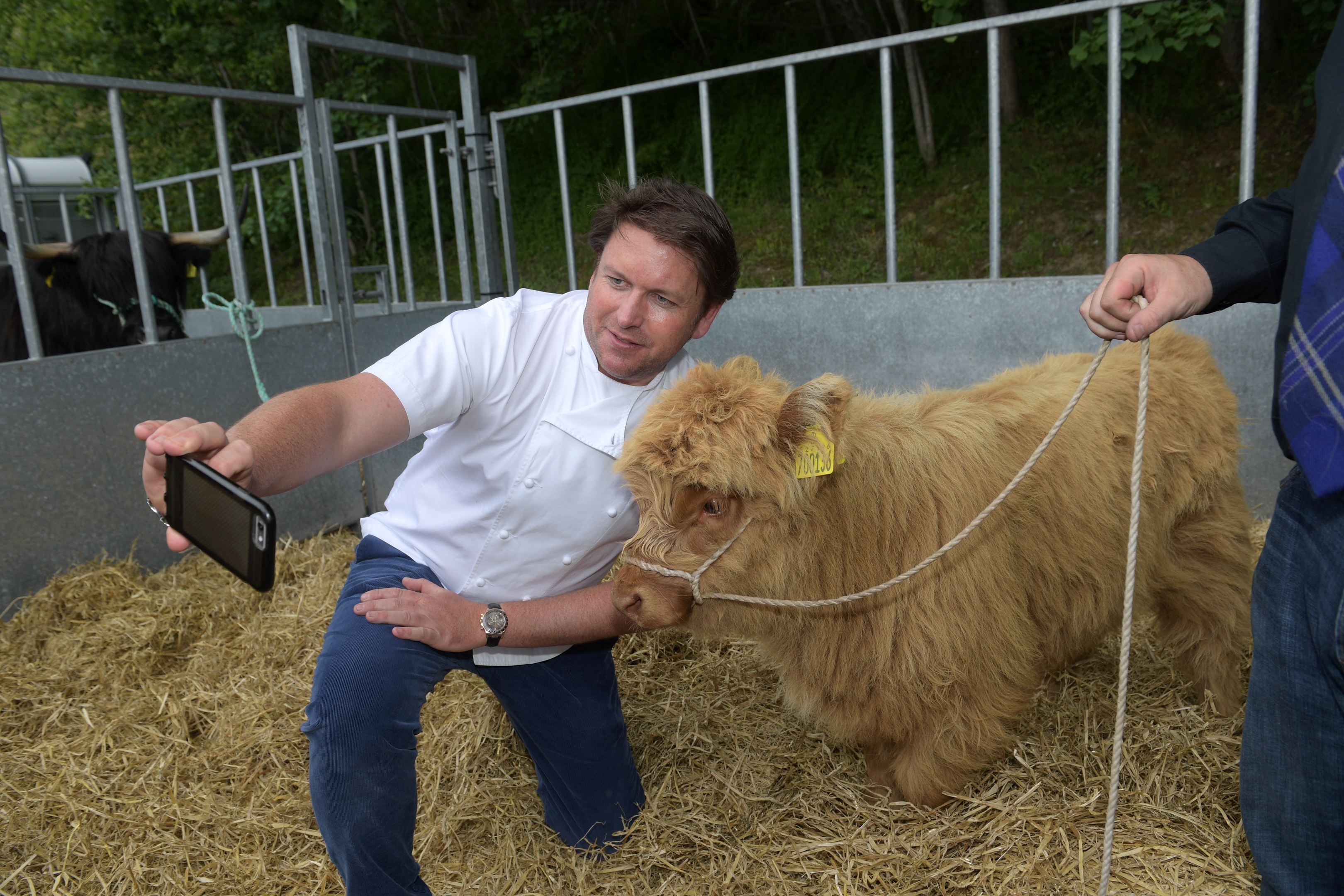 James Martin takes a selfie with a young coo.