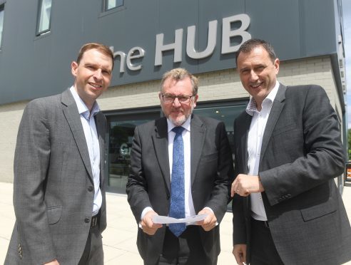 Scottish Secretary Davd Mundell, centre, visited The Hub in Aberdeen on Friday as apart of a Trip to the north-east. 
Pictured with him are James Bream, the director of policy at Aberdeen Chamber of Commerce and Russell Borthwick the chief executive of the Chamber of Commerce.