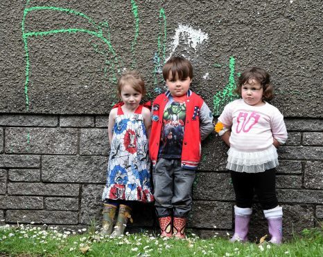 In the picture are pupils from left: Poppy Ramsay, 4, Liam Wallace, 5, and Kayla Carnegie, 4. 
Picture by Jim Irvine